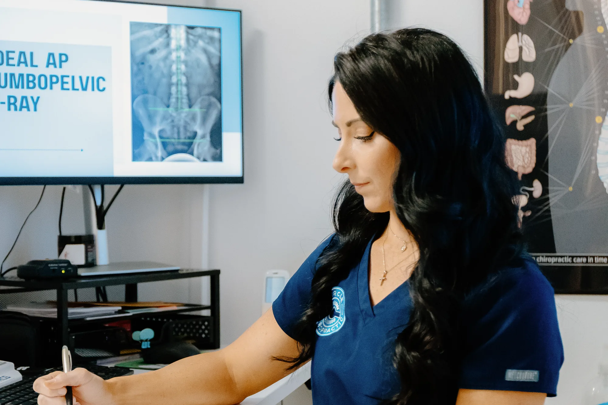 Dr. Carly Cunningham welcoming patients at the Circle Chiropractic Sarasota Southgate clinic